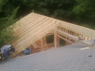 Framing a new roof addition that ties into an existing shingle roof in Caldwell